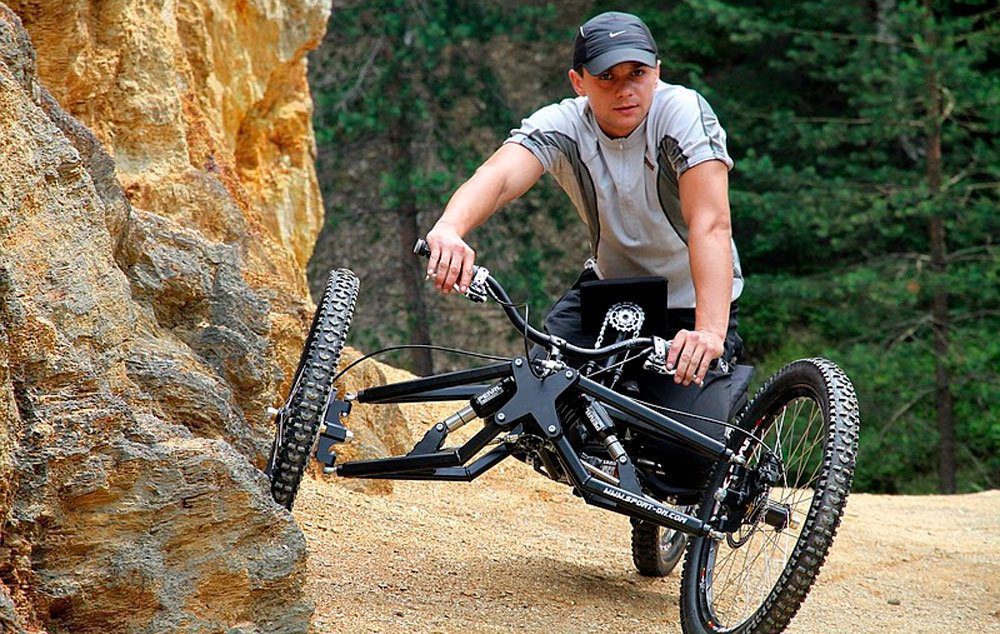 Mountain Handbike three-wheel system is reverse of most handcycles, with two wheels in the front and one in the rear