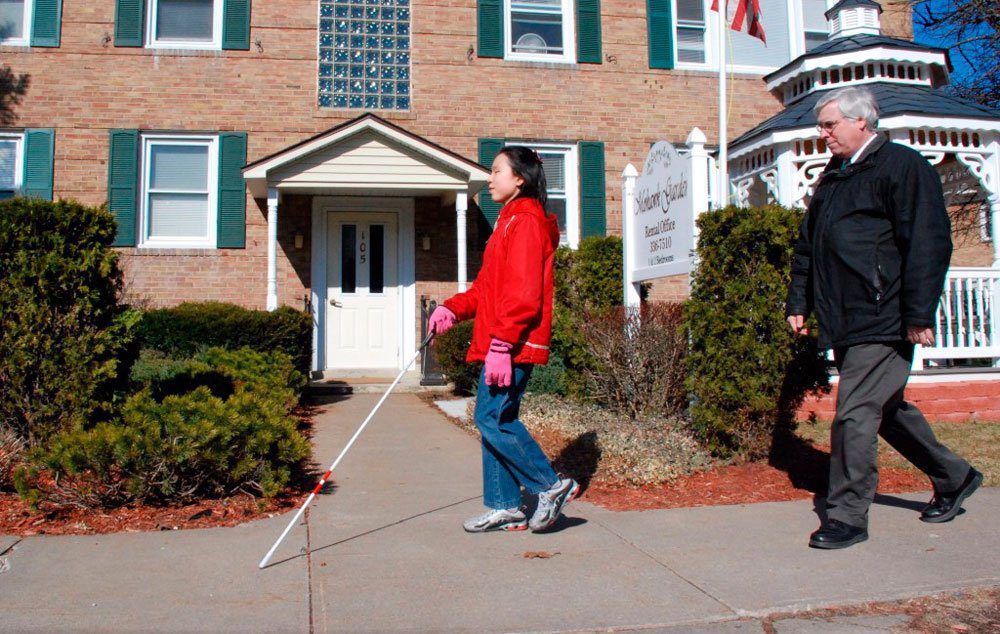 Many individuals who are blind or visually impaired use a long white cane as a mobility device