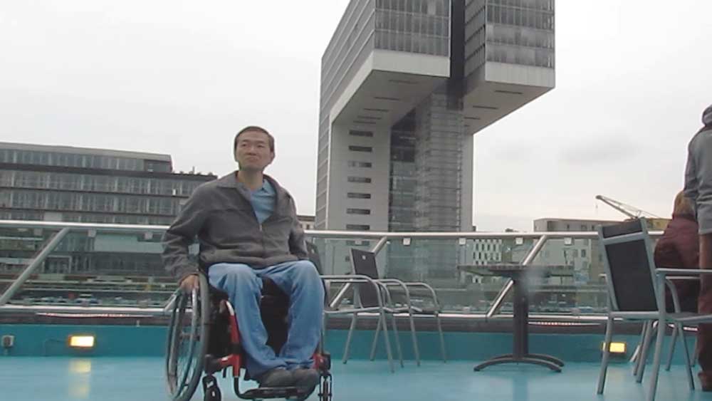 Man climbs CN Tower steps in wheelchair