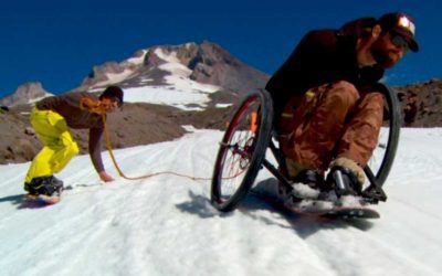 Paralyzed pro snowboarder rides again