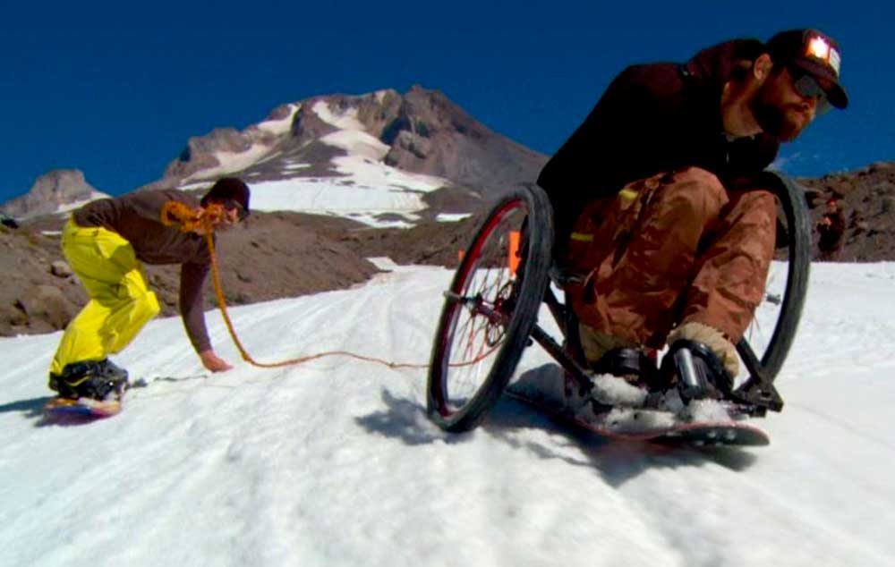 Tim Ostler, back on snow again with an adaptive snowboard