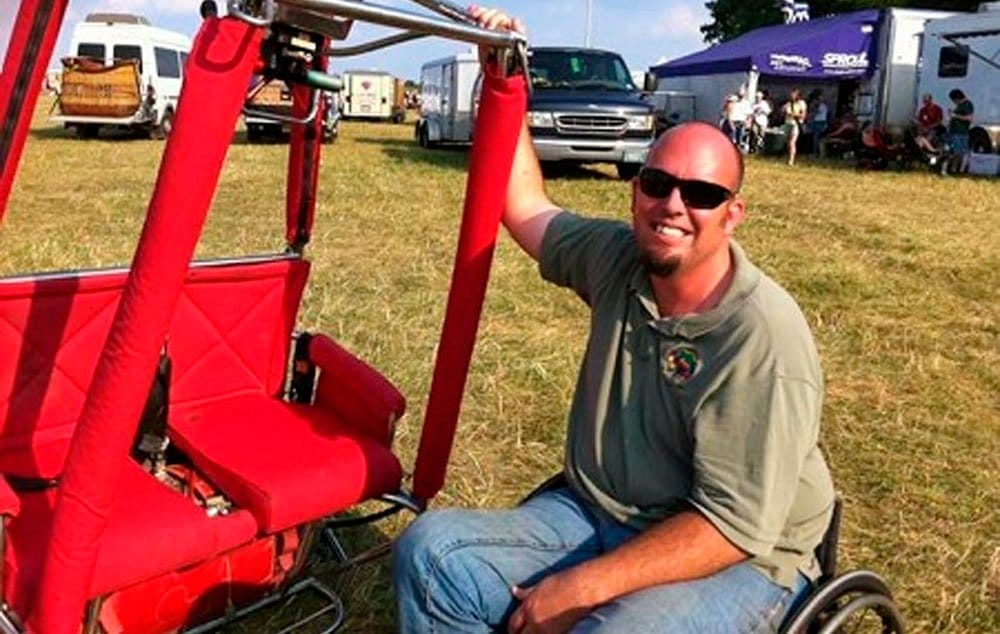 Michael Glen is happiest when he’s in his red chair, floating thousands of feet in the air and looking down at the world shrinking beneath his feet.