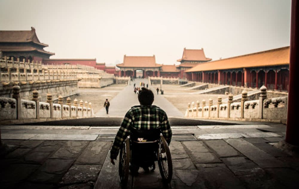 So you think it's tough to get around Beijing's public spaces on foot? Try in a wheelchair.