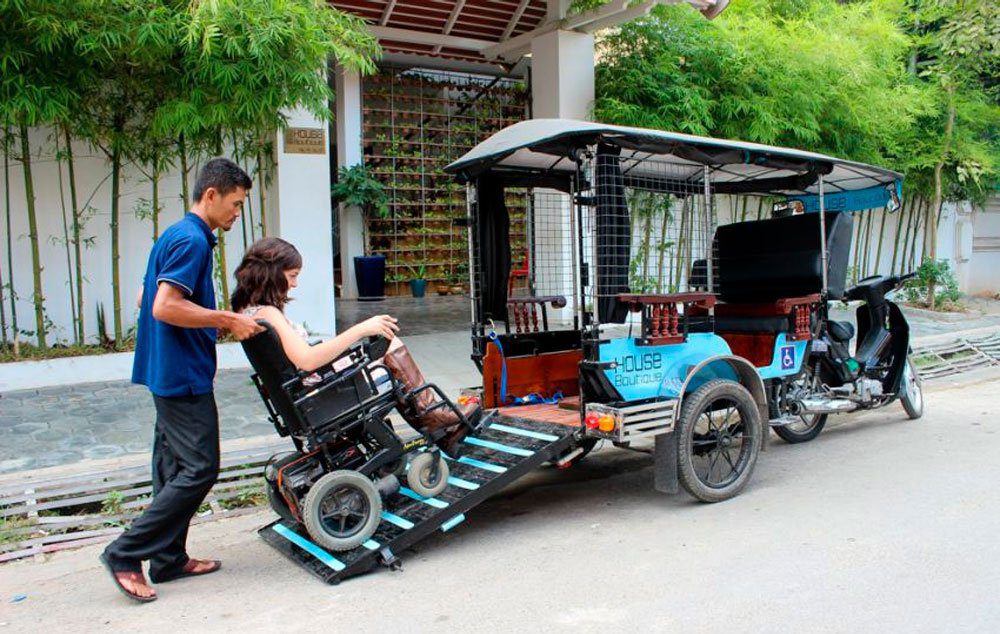 A new tuk-tuk prototype features a ramp for wheelchair accessibility. Iam Jones