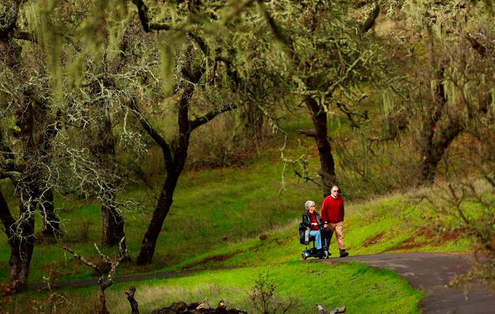 Jeanne Allen of Sonoma enjoys the accessible trail in Sonoma Valley Regional Park with her husband