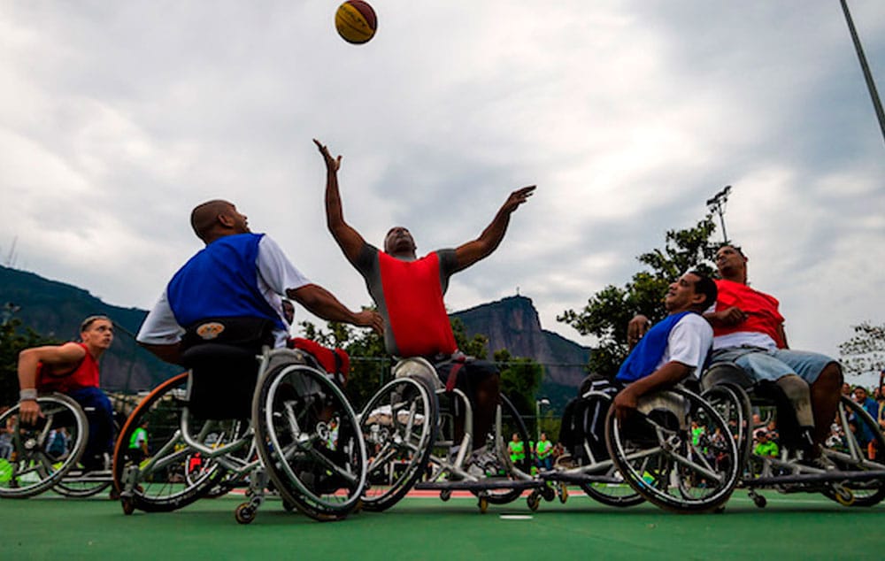 Brazilian Paralympic athletes play basketball in wheelchairs during an event celebrating one year until the start of the Rio 2016 Paralympic Games