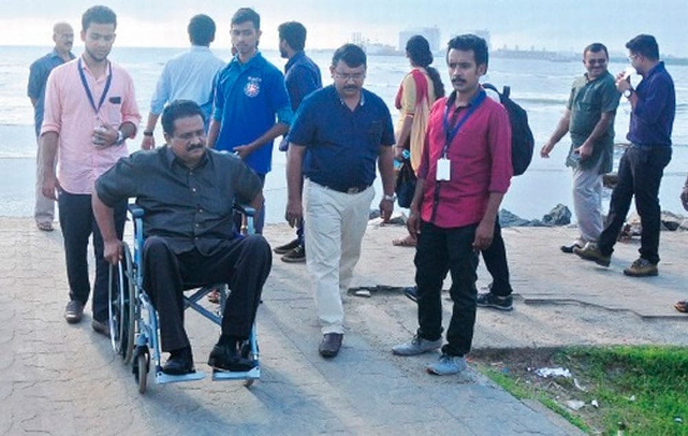 Simon George inspecting the Fort Kochi beach to prepare the feasibility study for converting Fort Kochi as a differently-abled tourist-friendly spot