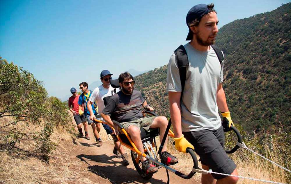 UC Berkeley student Álvaro Silberstein sets out in a wheelchair with help from friends to trek three wild regions in Chile’s Torres del Paine park.