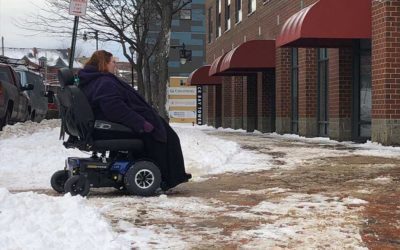 Wheelchair and snow in Portland. Accessibility on the sidewalks is difficult in the winter season.