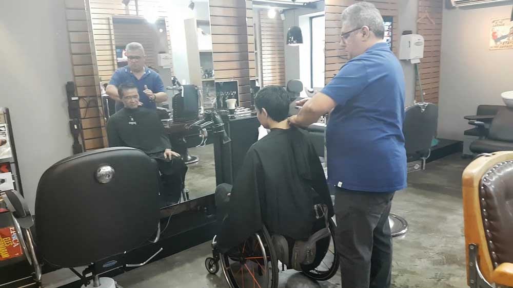 Man climbs CN Tower steps in wheelchair