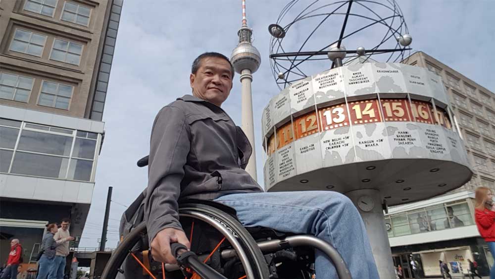 Man climbs CN Tower steps in wheelchair