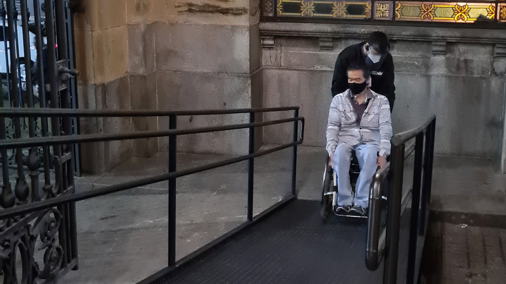 Man climbs CN Tower steps in wheelchair