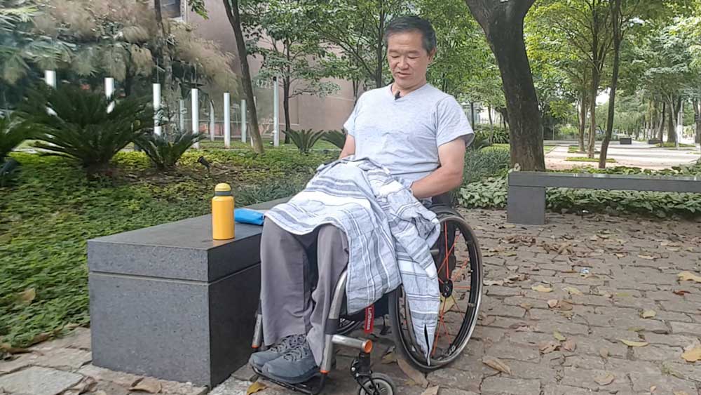 Man climbs CN Tower steps in wheelchair