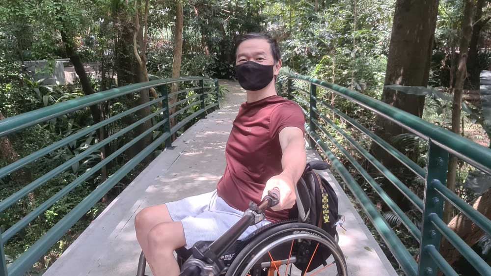 Man climbs CN Tower steps in wheelchair