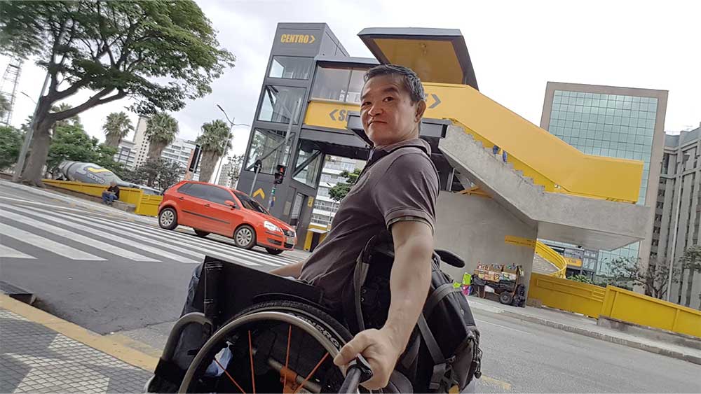 Man climbs CN Tower steps in wheelchair