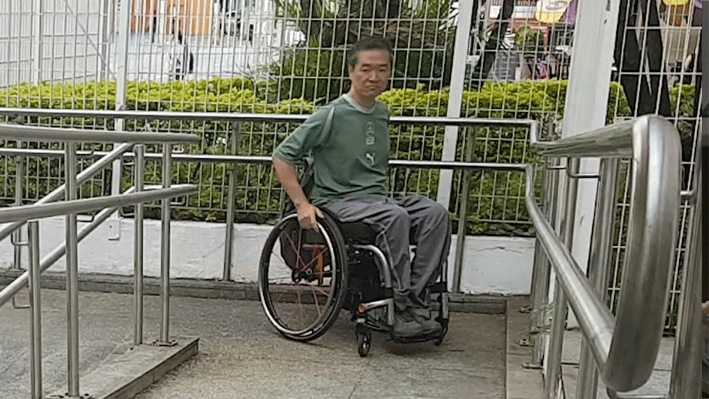 Man climbs CN Tower steps in wheelchair